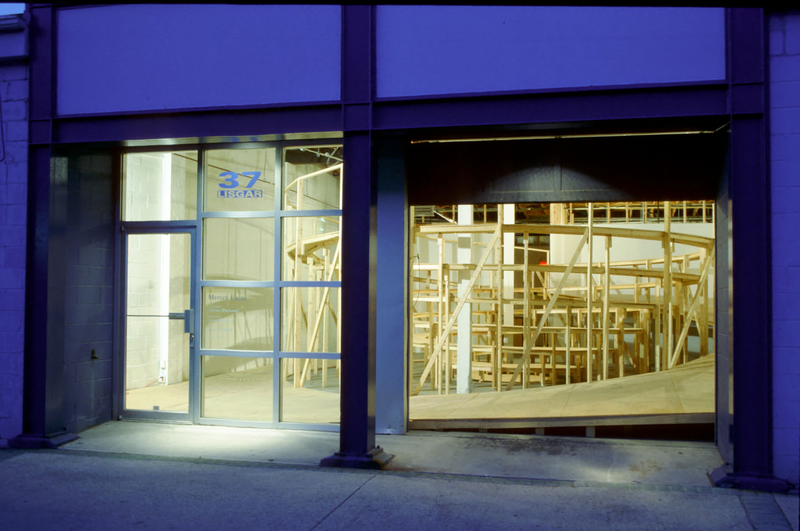 Model for a Public Space, plywood construction (Architecture Gallery at the University of Manitoba, Winnipeg and Mercer Union, Toronto) 2000. Photo 1: Rafael Gomez-Moriana, Photo 2: Mercer Union.